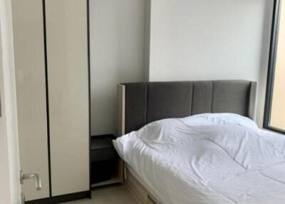 Modern bedroom with bed and wardrobe