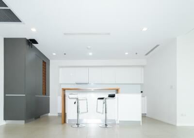 Modern kitchen with breakfast bar and stools