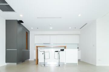 Modern kitchen with breakfast bar and stools