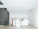 Modern kitchen with breakfast bar and stools