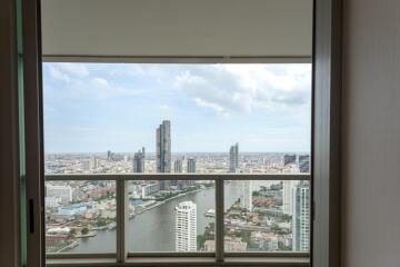 A view from the balcony showing the city skyline and river