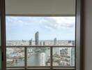 A view from the balcony showing the city skyline and river