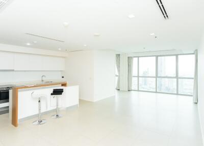 Modern kitchen and dining area in a bright apartment