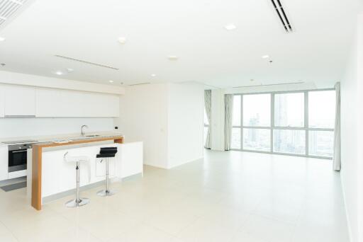 Modern kitchen and dining area in a bright apartment