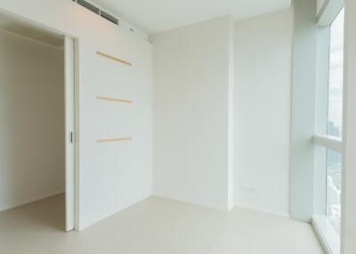 Minimalist empty bedroom with large window