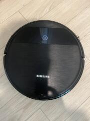 Robot vacuum cleaner on wooden floor