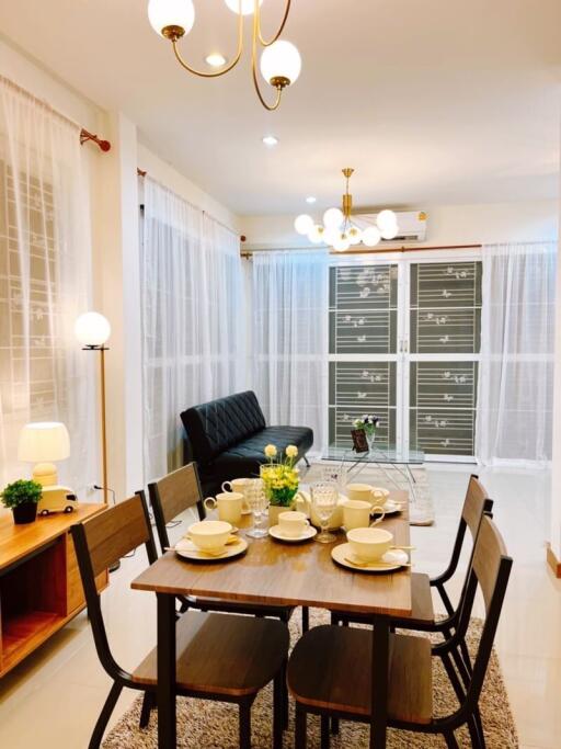 Modern living room with dining area and furniture