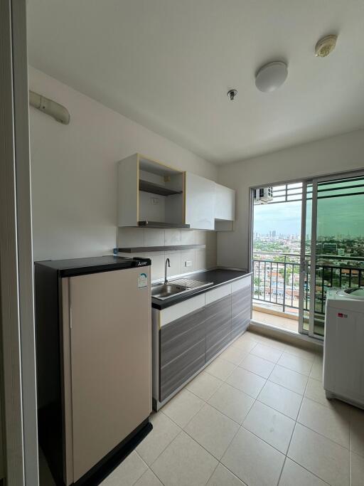 Modern kitchen with balcony view