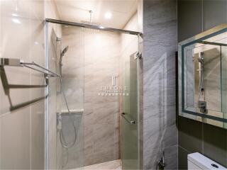 Modern bathroom with glass shower enclosure