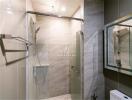 Modern bathroom with glass shower enclosure