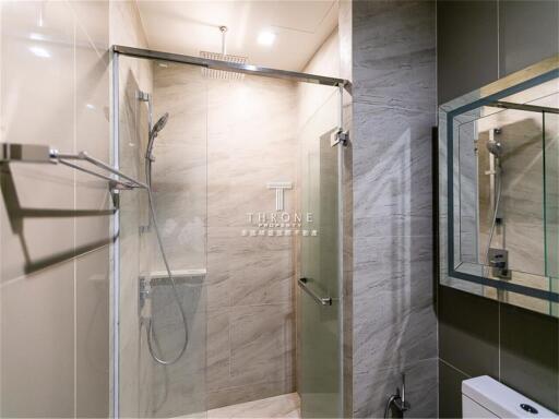 Modern bathroom with glass shower enclosure