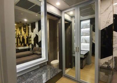 Master bedroom with mirror closet and vanity desk