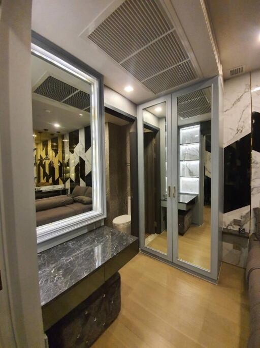 Master bedroom with mirror closet and vanity desk