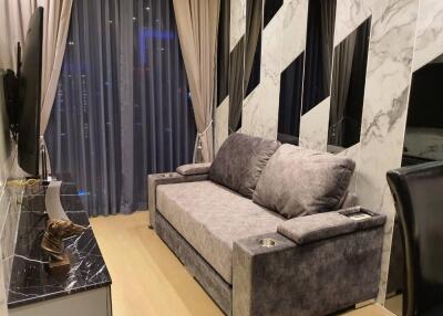 Contemporary living room with a gray sofa
