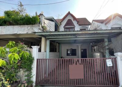 Front view of the house including garage and front garden