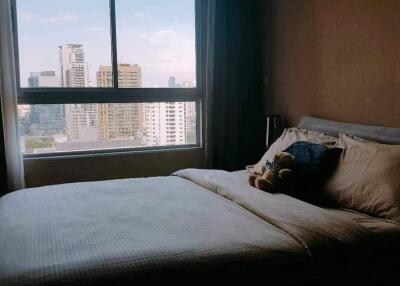 Bedroom with a city view