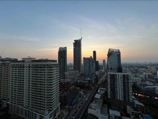 Cityscape view with modern buildings at sunset