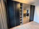 Spacious bedroom with large built-in wardrobe