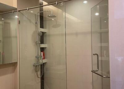 Modern bathroom with glass shower enclosure