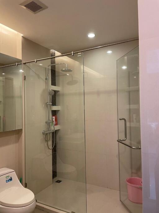 Modern bathroom with glass shower enclosure