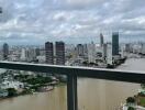 Cityscape view from high-rise balcony with river