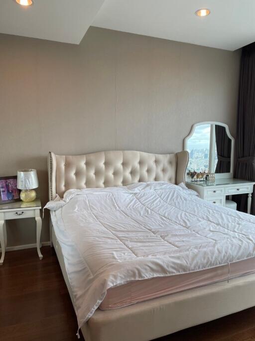 Modern bedroom with upholstered bed and vanity table