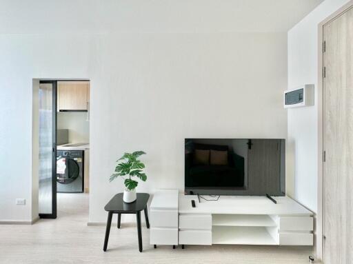 Modern living room with TV and minimalistic furniture