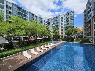 Outdoor pool area of residential building complex