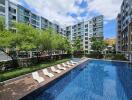 Outdoor pool area of residential building complex