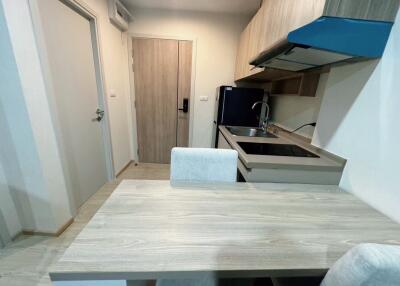 Compact kitchen with dining table