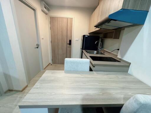 Compact kitchen with dining table