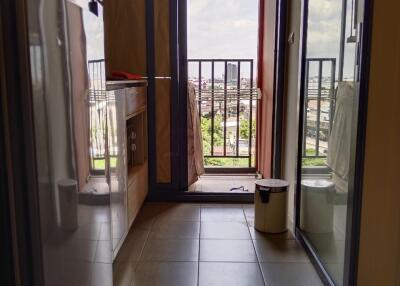 Small modern kitchen with balcony view