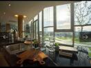 Modern kitchen with island and large windows