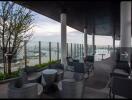 Rooftop lounge area with city and river view