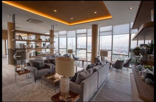 Modern, spacious living room with city views