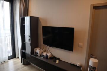 Living room area with entertainment setup