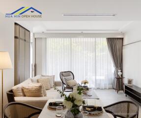 Well-furnished living room with natural light