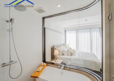 Modern bedroom with an adjoining bathroom