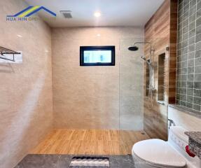 Modern bathroom with shower and toilet