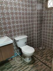 Bathroom with patterned tile