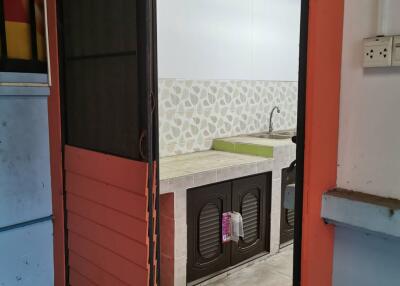 Partial view of kitchen from doorway