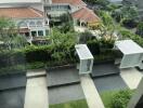 view of outdoor seating area with greenery