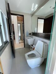 Modern bathroom with toilet and washbasin