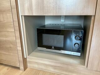 Microwave in kitchen cabinet