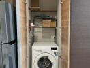 Compact laundry space with washing machine