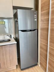 Modern kitchen with refrigerator and sink