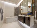 Modern bathroom with bathtub and dual sinks