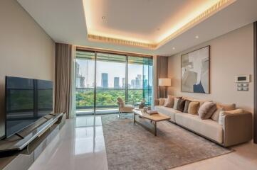 Modern living room with large windows and cityscape view