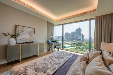 Modern bedroom with large windows and city view