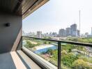 City view from modern balcony with railing